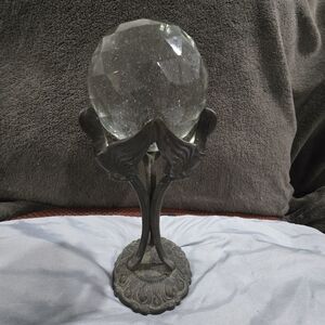 Elegant Crystal Ball on Ornate Stand